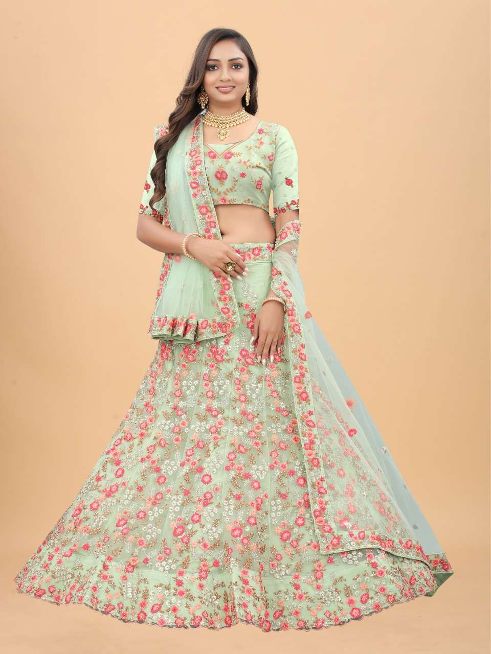 CODE-4918 BY ASLIWHOLESALE HEAVY NET EMBROIDERED LEHENGA