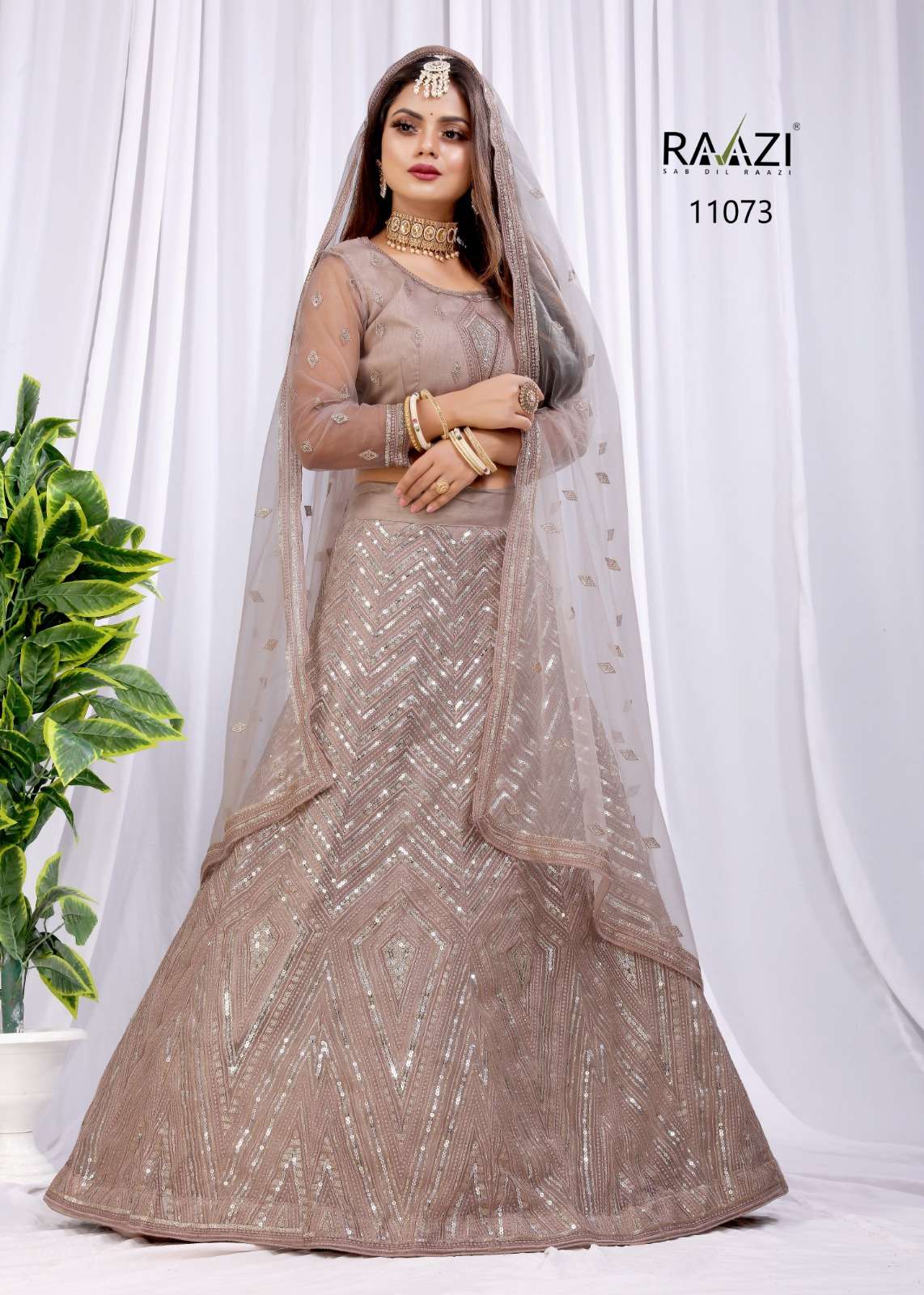 MAHAVESH BY RAAZI 11073 TO 11078 SERIES SOFT NET HEAVY WORK LEHENGAS