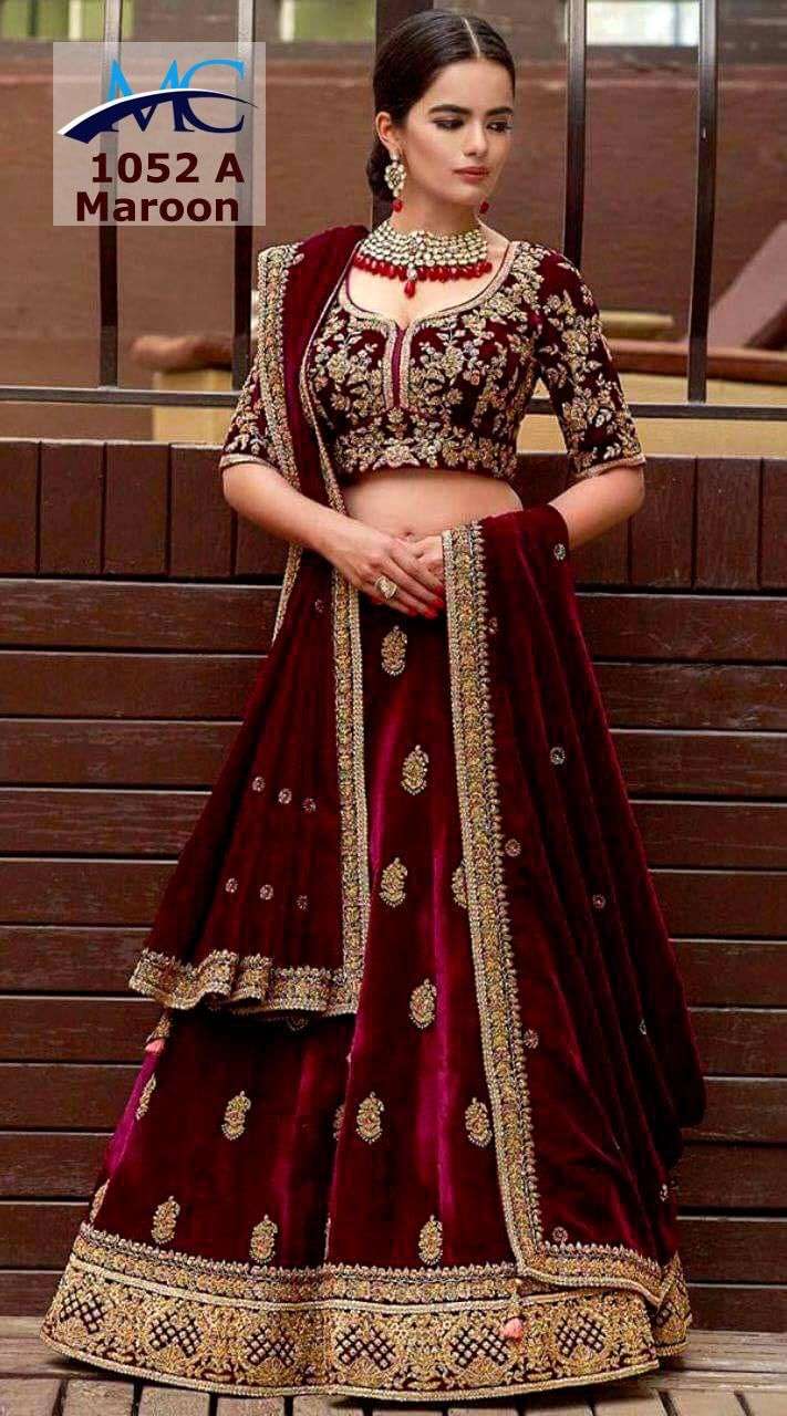 MC-1052 A BY MANSI CREATION PURE VELVET EMBROIDERY BRIDAL LEHENGAS