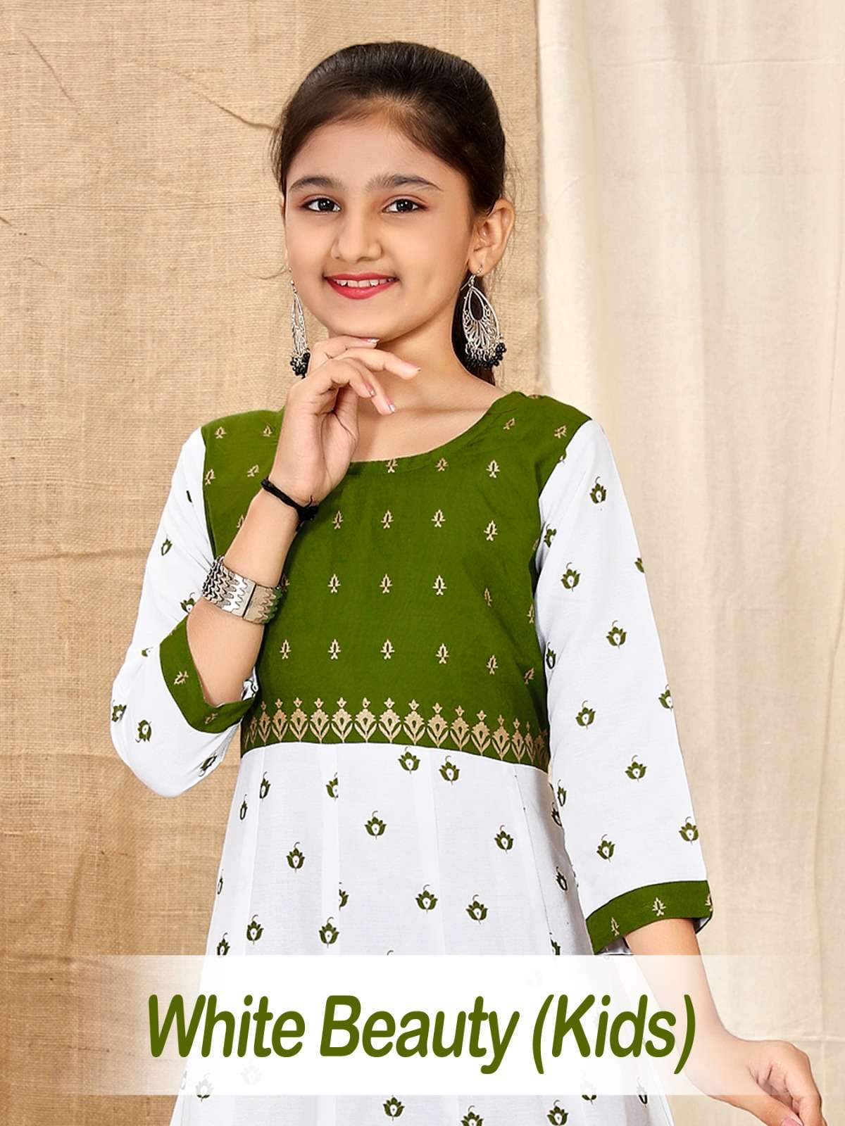 WHITE BEAUTY KIDS BY ASLIWHOLESALE FANCY RAYON KIDS KURTIS