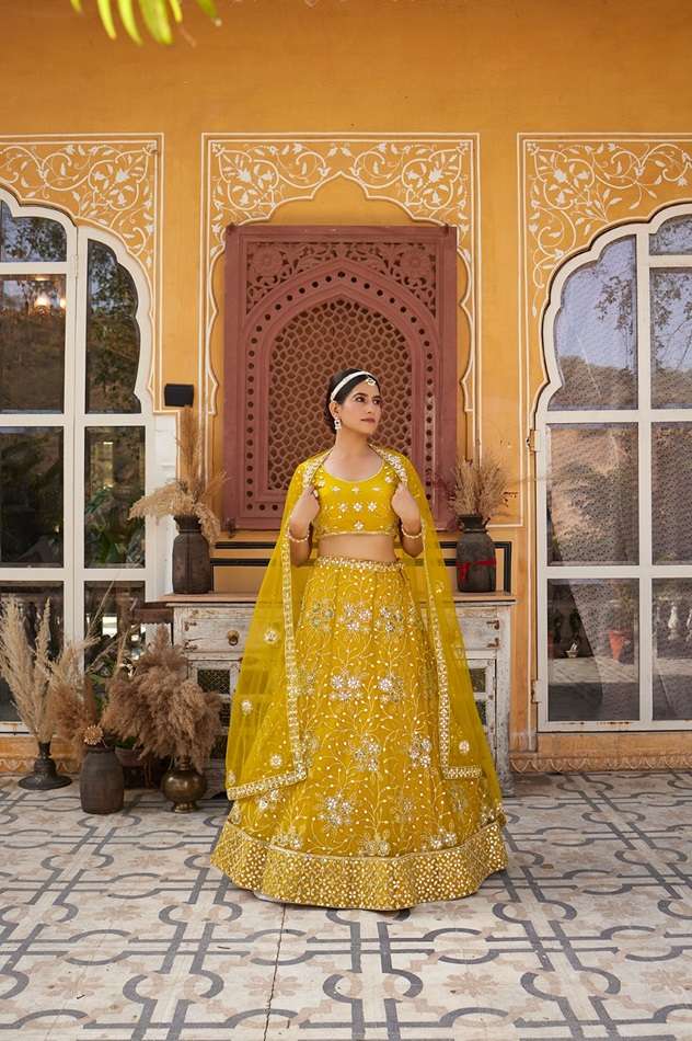 SS-153-1843 BY ASLIWHOLESALE INDIAN DESIGNER NET WORK LEHENGAS