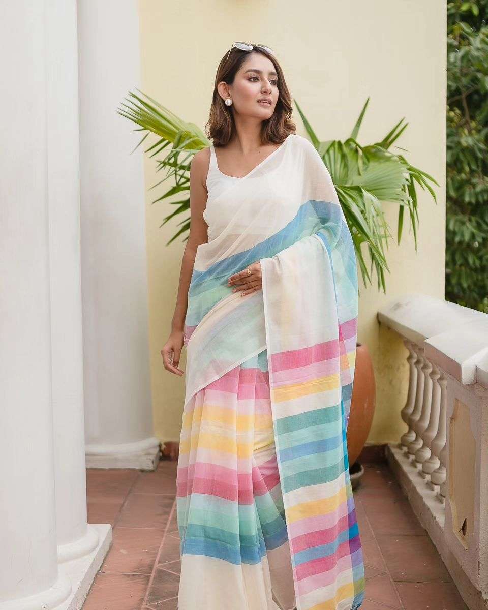 MG515 BY ASLIWHOLESALE DESIGNER FANCY PLAIN LINEN PRINTED SAREES